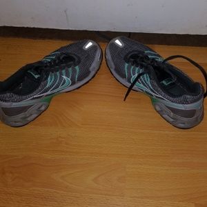 Sea foam green and grey Nike Air shoes